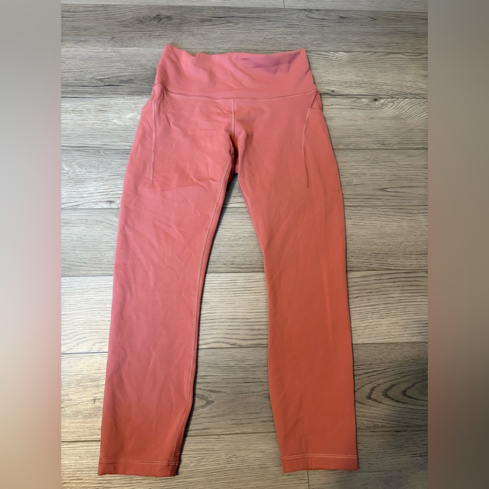 LULULEMON WUNDER TRAIN WITH POCKETS LEGGINGS SIZE 8 LIGHT PINK